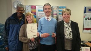 Staff and Service users in East Surrey on receiving their Enrich award for Hope