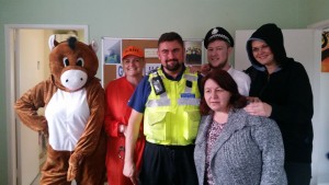 PCSO Bell alongside staff and residents at Eamont Terrace